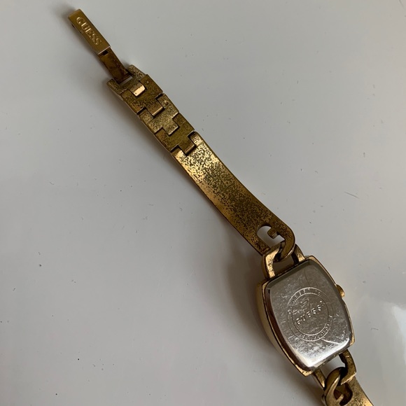 Guess interlocking G skinny gold watch main image 5